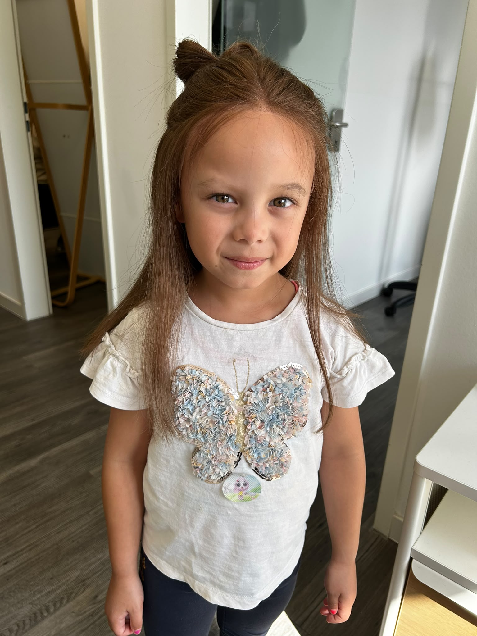 Young HEADS client with a long half-up style at the Makati studio